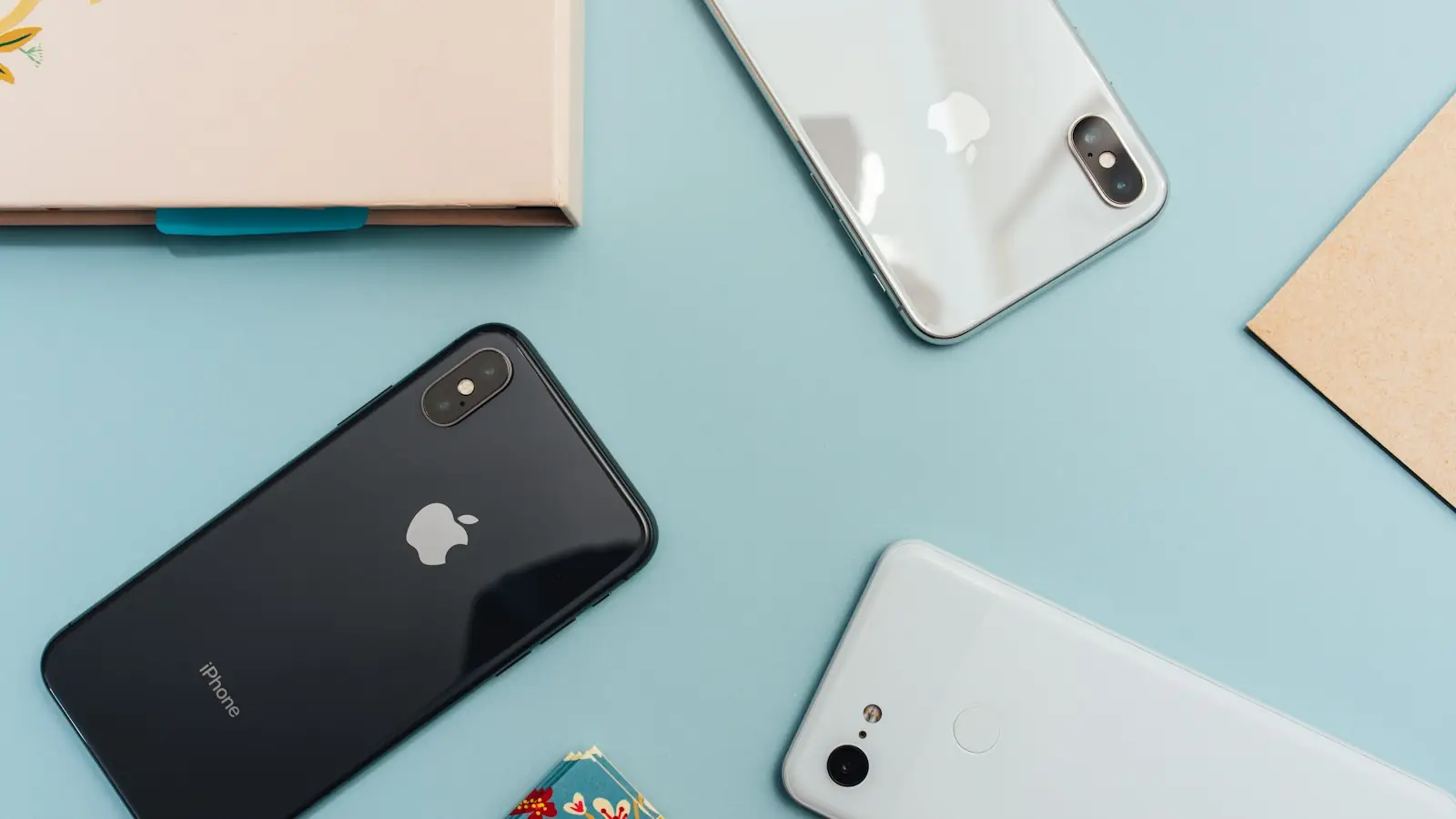 Two smartphones lying on a table