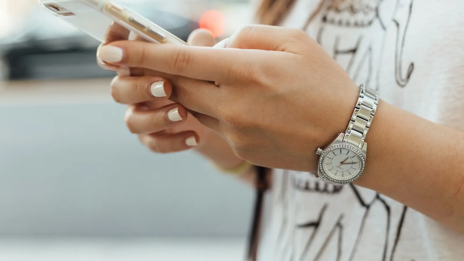 Hands holding a smartphone