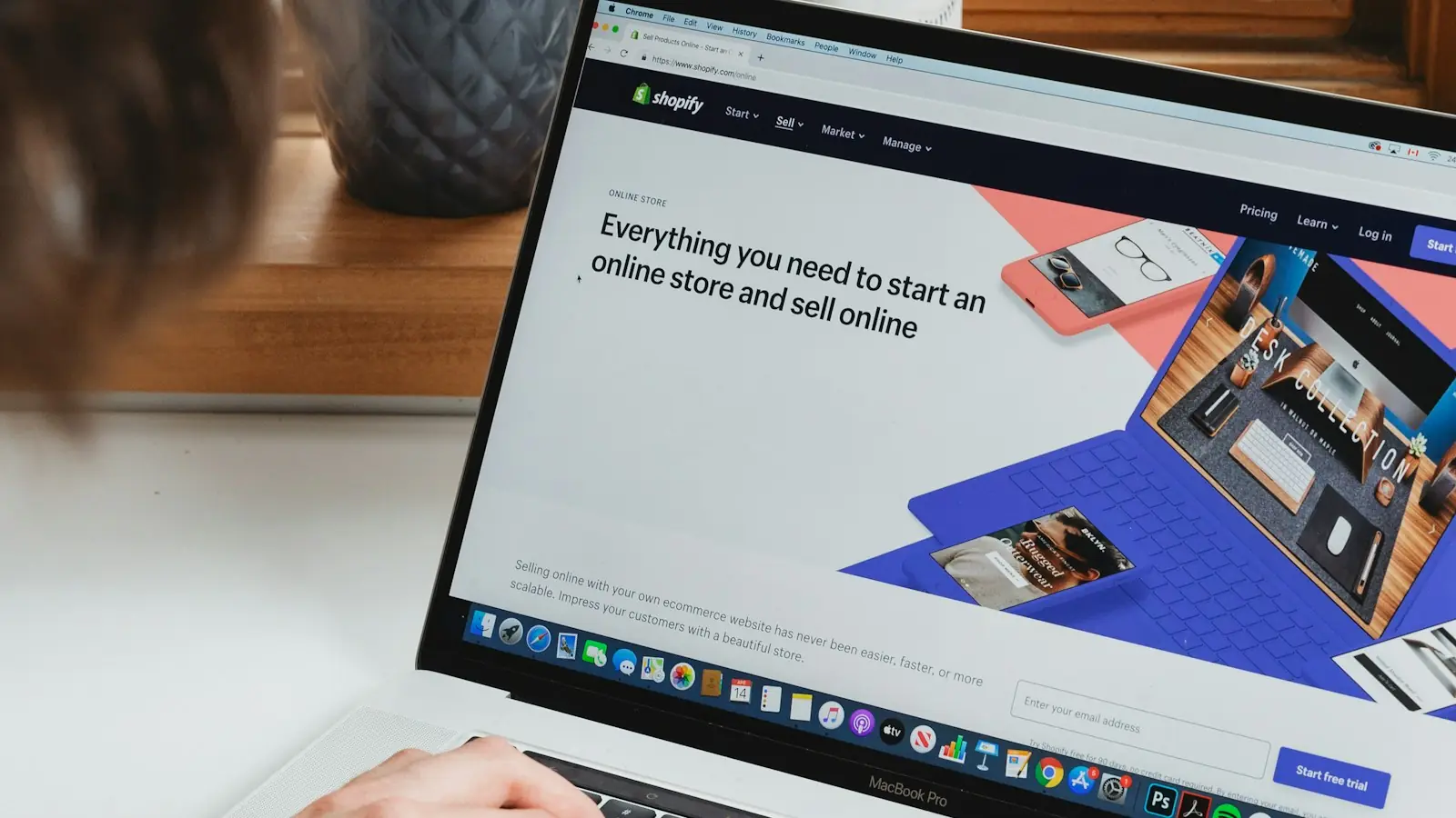 Person browsing a website on a laptop
